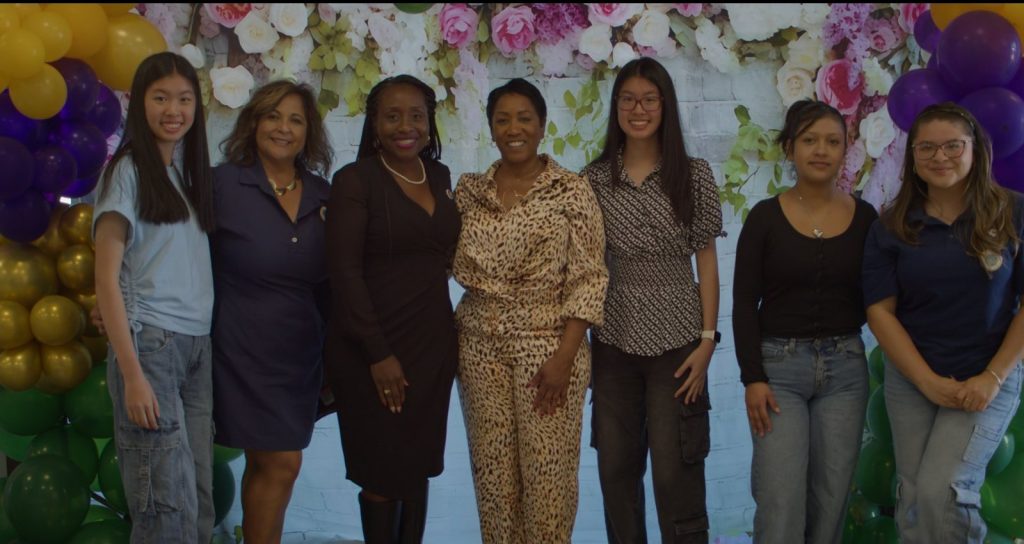 Ronna Green with a group of women at a celebration