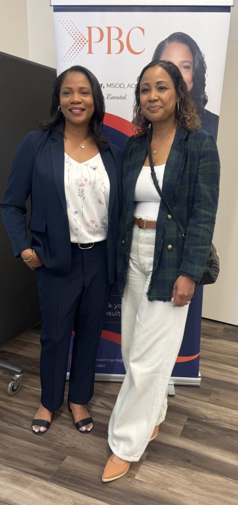 Ronna Green with a guest at a professional event