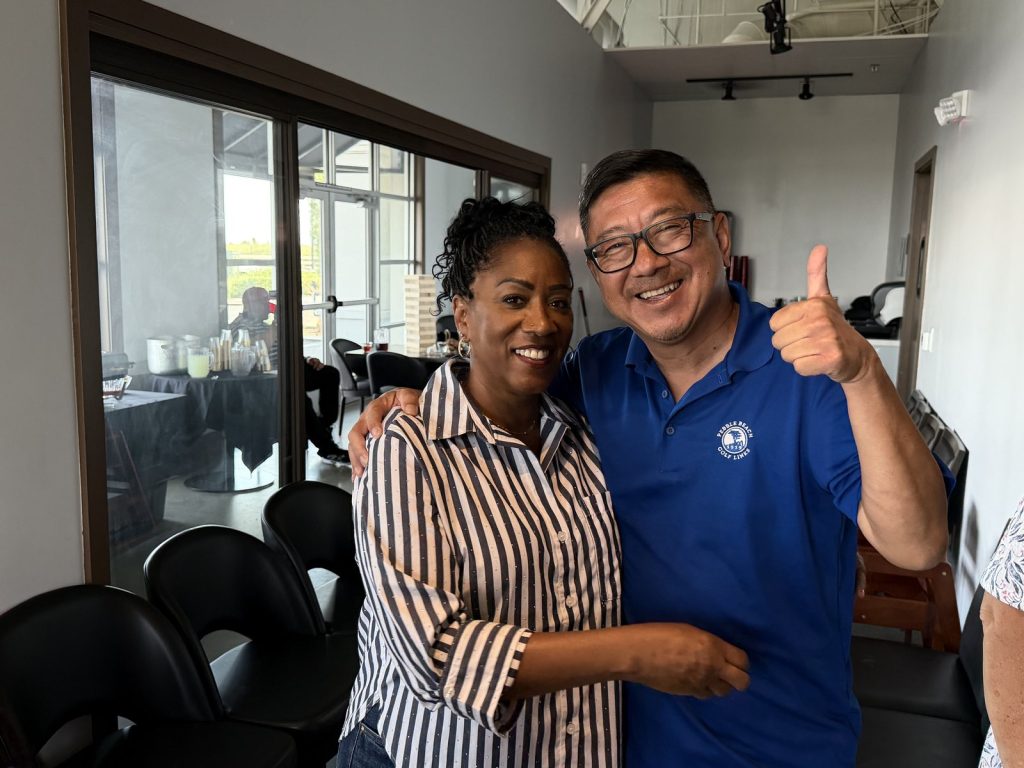 Ronna Green with a supporter giving a thumbs up