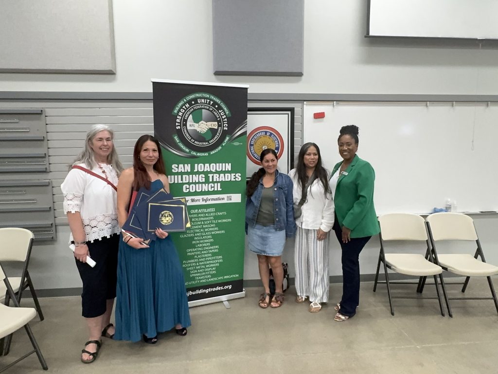 Ronna Green with guests at a San Joaquin Building Trades Council event